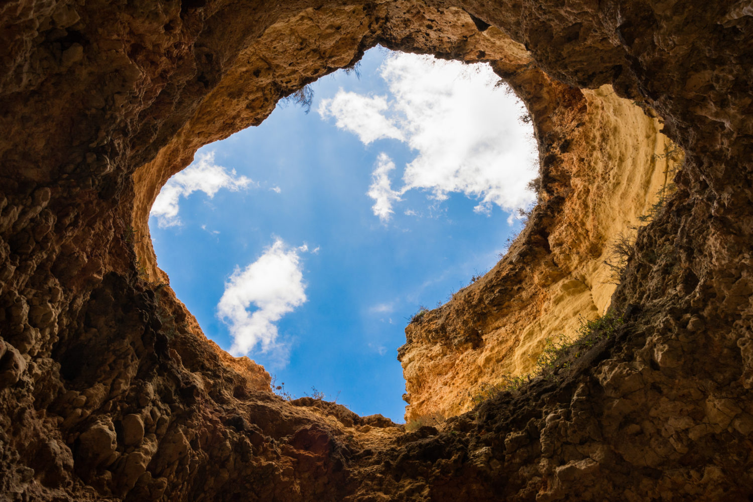 Standing in a hole looking up at the sky